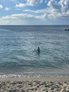 Woman finding a spiritual Moment in the Ocean