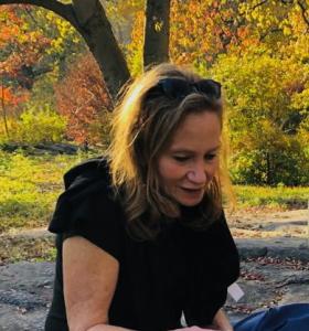 Woman Sitting in Central Park