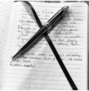 Pen on Notebookwith written words