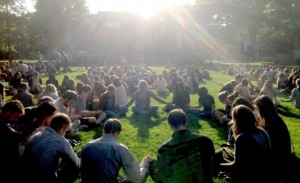 Students pray on lawn at SPU after shooting at the school.