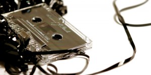 50614-stock-photo-music-listening-tape-cassette-symbols-metaphors-tape-spaghetti-radio-play
