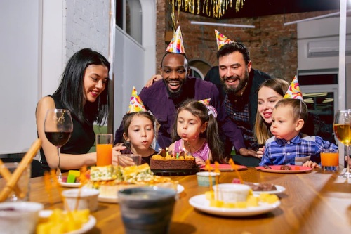 <a href="https://www.freepik.com/free-photo/portrait-happy-multiethnic-family-celebrating-birthday-home_11166772.htm#query=Family%20celebrations&position=8&from_view=search&track=ais">Image by master1305</a> on Freepik