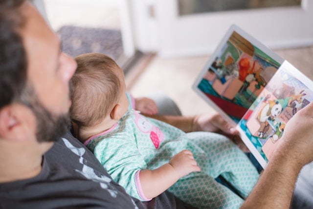 https://unsplash.com/photos/person-carrying-baby-while-reading-book-EQlTyDZRx7U?utm_content=creditShareLink&utm_medium=referral&utm_source=unsplash