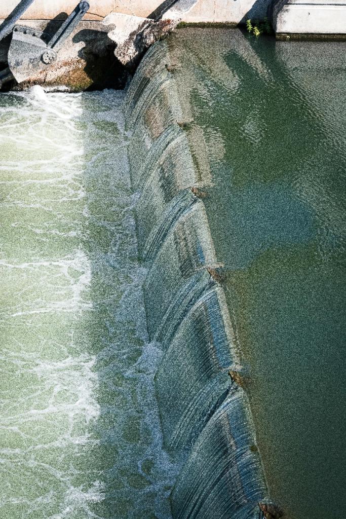 Photo by Jean Marc Bonnel: https://www.pexels.com/photo/lowered-floodgate-on-the-canal-17761547/