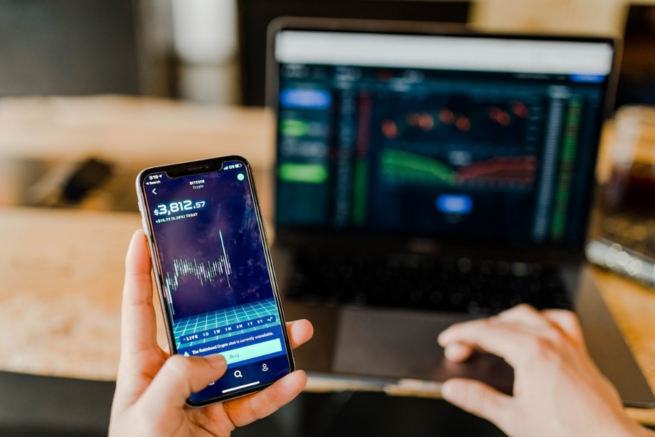 https://unsplash.com/photos/person-using-phone-and-laptop-computer-EMPZ7yRZoGw?utm_content=creditShareLink&utm_medium=referral&utm_source=unsplash