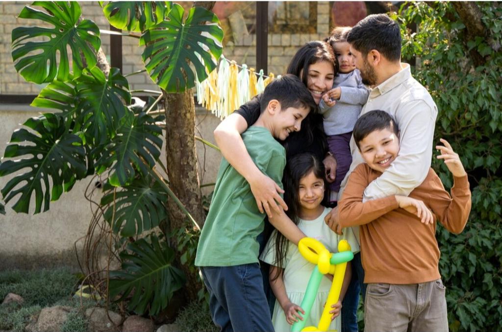https://www.freepik.com/free-photo/kids-having-fun-jungle-themed-party_27330618.htm#fromView=search&page=1&position=20&uuid=dcb383fd-3c66-4702-a4ab-5e7520b6f08b&query=Warm+Indian+family+scene