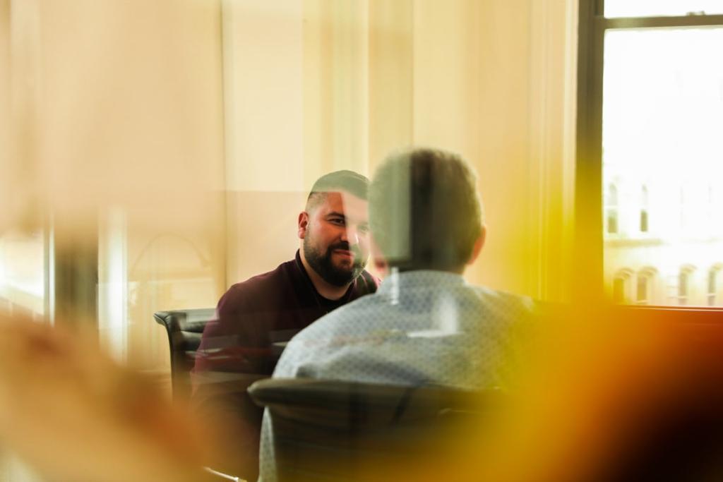 https://unsplash.com/photos/man-sitting-indoors-U8hxFaZK3tc?utm_source=unsplash&utm_medium=referral&utm_content=creditShareLink