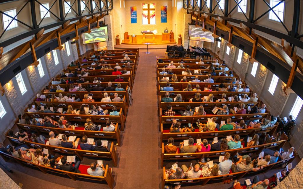 https://unsplash.com/photos/congregation-seated-in-a-church-during-a-service-bJnndmmymW8