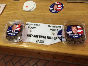 Sign for chocolate candy at a general store: "Republican Poop, Democrat Poop - They are both full of it"