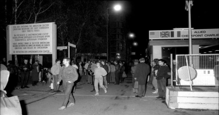 East Berliners walk through Checkpoint Charlie the night of Nov. 9-10, 1989