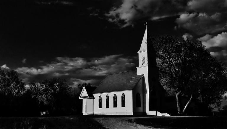 Rural Lutheran church in shadow