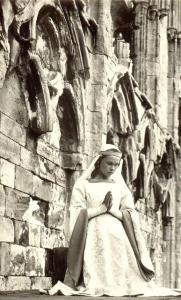 image of a kneeling woman