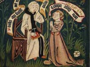 A priest taking the confession of a woman.