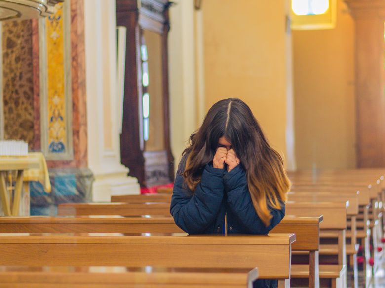 a young woman in the pew