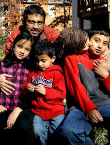 family shot Dilshad kissing Lil D