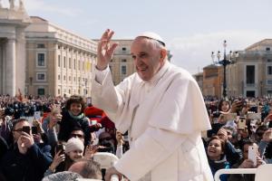 Pope Francis waving to the crowd at St. Peter's