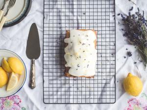 Lemon pound pound cake on a cooling rack.