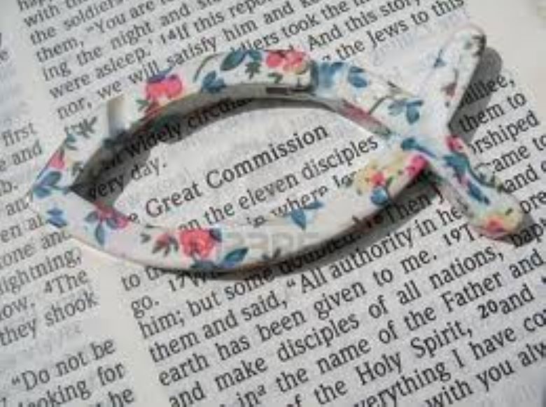 Flowery Icthus on Bible page highlighting the words "Great Commission"