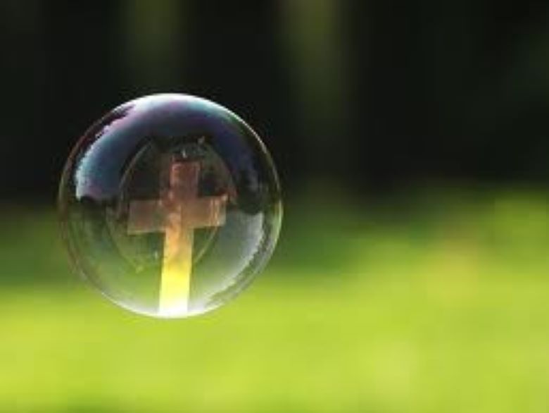 A floating bubble with a cross inside