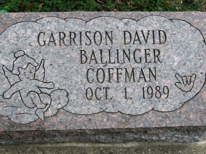 Gravestone reading "GARISON DAVID BALLINGER COFFMAN OCT. 1, 1989" with an angel on a cloud to the left, and infant-sized fingers making the I Love You sign on the right