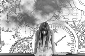 A woman looks down as if doubting herself. Behind her are clocks overlaid over each other on grey and white background.