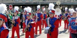 Marching band in red and blue uniforms