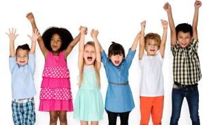 children with hands held up