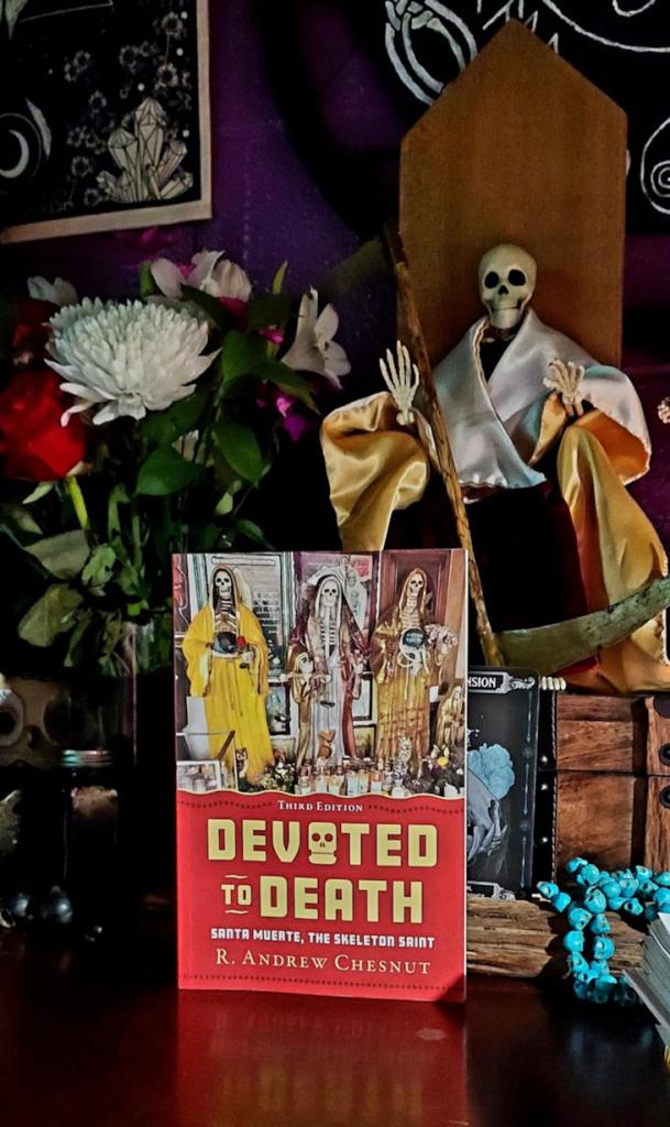 Book on altar with flowers