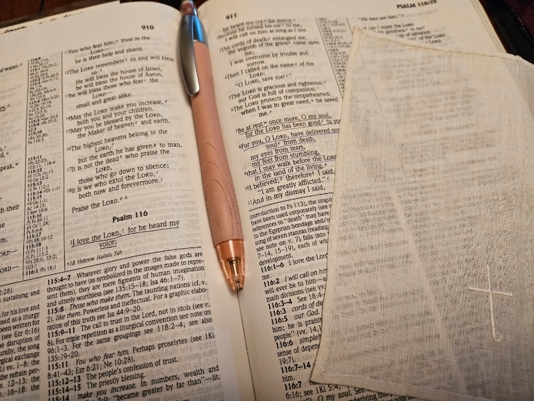 Bible open to Psalm 116 showing God's Redeeming Love