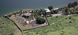 Capernaum from the air, with green and sea.