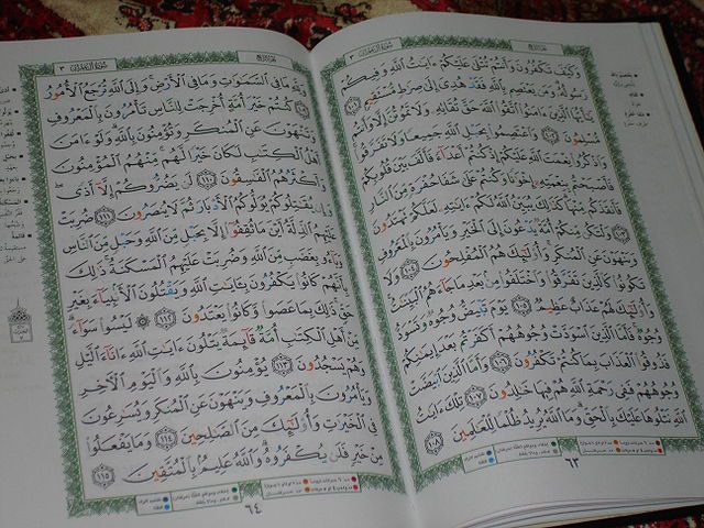 Arabic Qur’an, open (WIkimedia Commons)