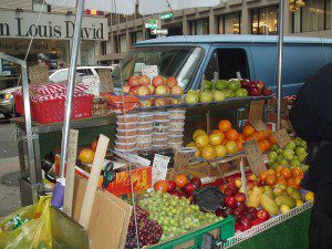 A fruit stand, with other stuff.