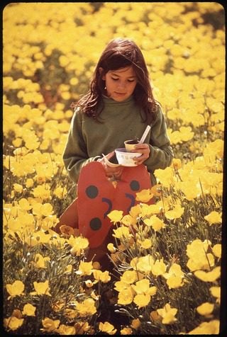Girl in field of flowers