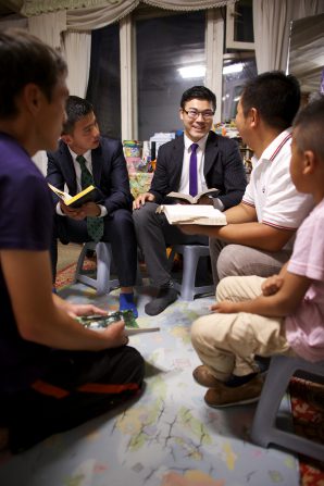 Two Mongolian home teachers at work