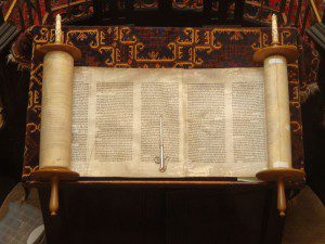 A handwritten Torah scroll
