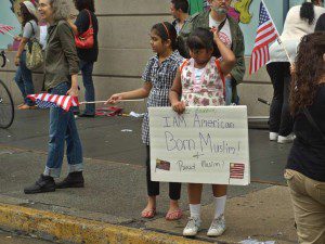 Two Muslim girls with American flags