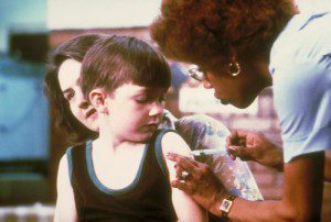 Little boy getting a shot