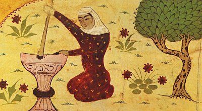 Rabi‘a preparing grain