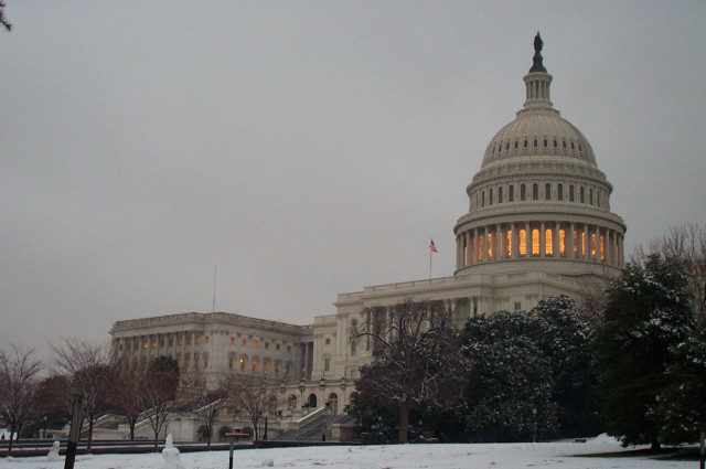 The U.S. Capitol by night, in the winter