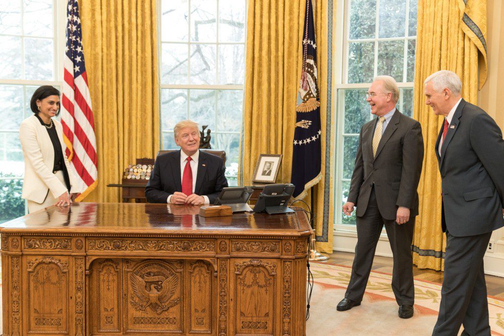 Trump and others in the Oval Office