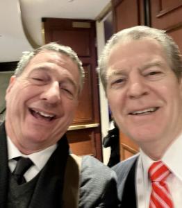 a close-up selfie iPhone photo shows the close acquaintanceship between Rev. Rob Schenck and Religious Freedom advocate Ambassador Sam Brownback.