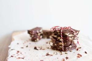 stack of chocolate almond bark pieces tied up in a bow