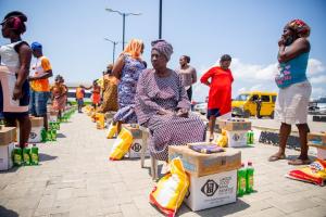 a group of women receiving aid from the humanitarians at the Lagos Food Bank Initiative