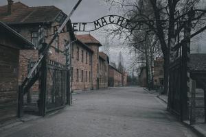 arbeit macht frei sign at Auschwitz, all the light we cannot see