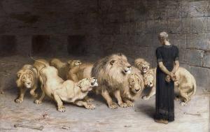 A man standing before a group of lions