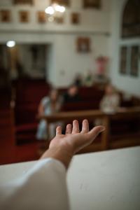 Extending hand toward others