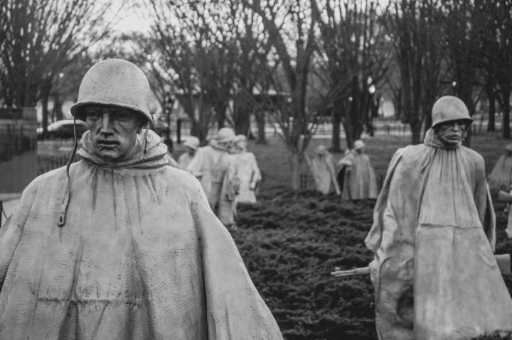 A grayscale photo of soldiers at the Korean War Memorial, Washington, DC