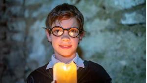 Child with candle