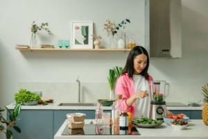 Woman in Kitchen with Blender
