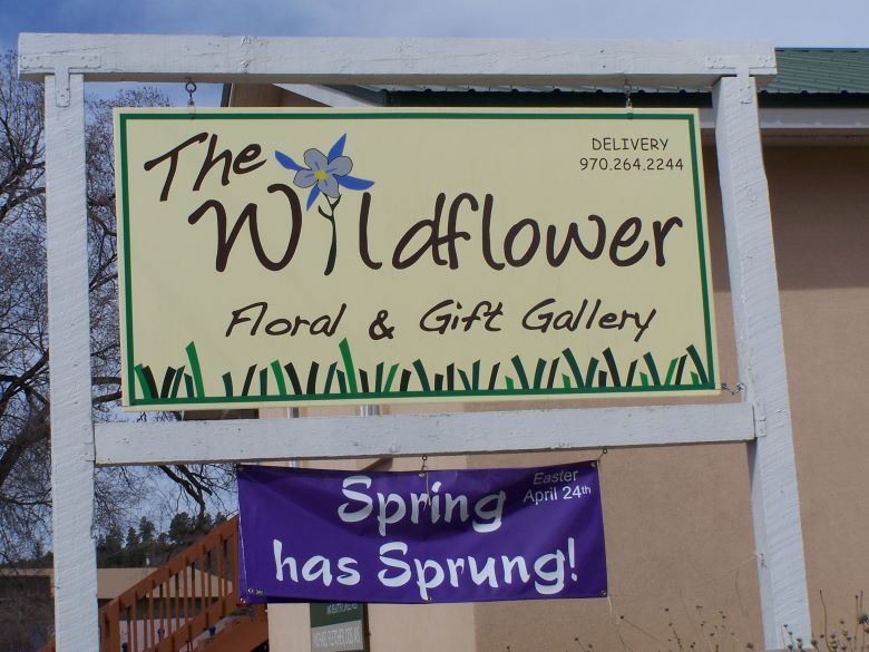 Yellow Wildflower Gift Shop Sign. 
